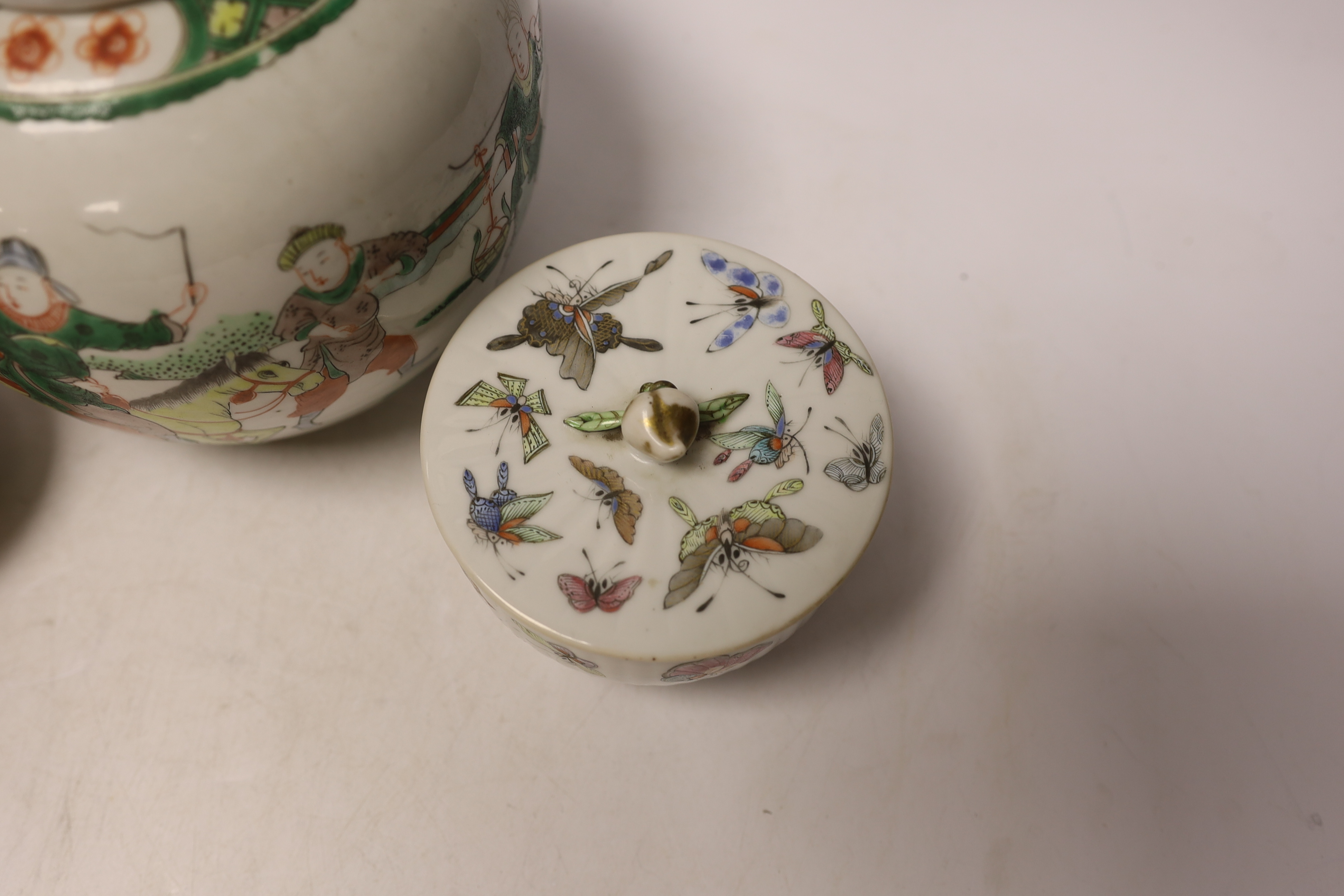 A Chinese famille rose 'butterfly' bowl and cover, Tongzhi mark and period, a famille verte jar and a pair of millefleur vases, tallest 19cm (4)